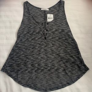 Lush brand flowy tank top in the color black